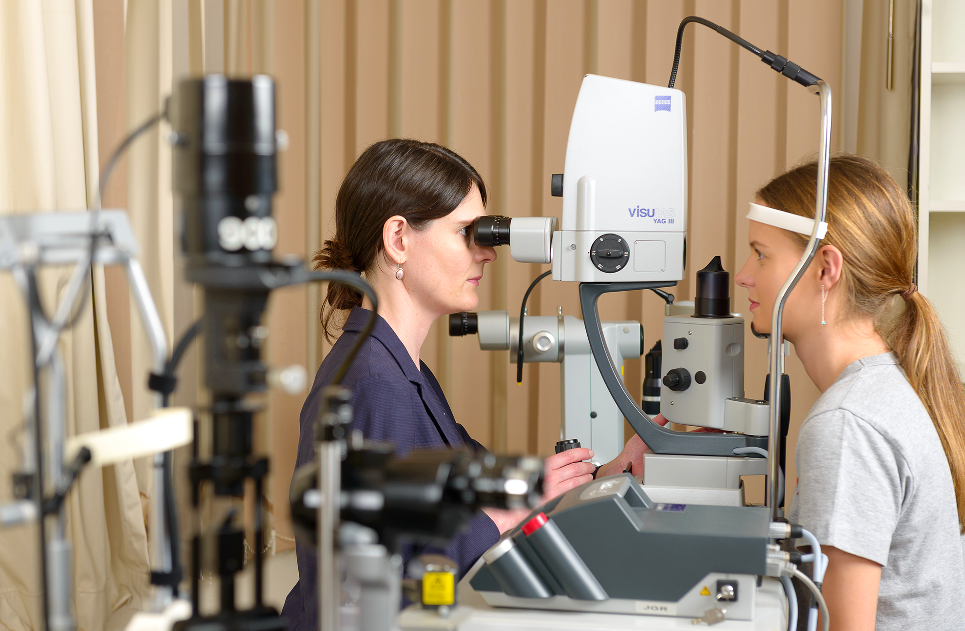 Dr Gregory-Roberts examining a patients eye at Eye Specialist Practice Bondi Junction